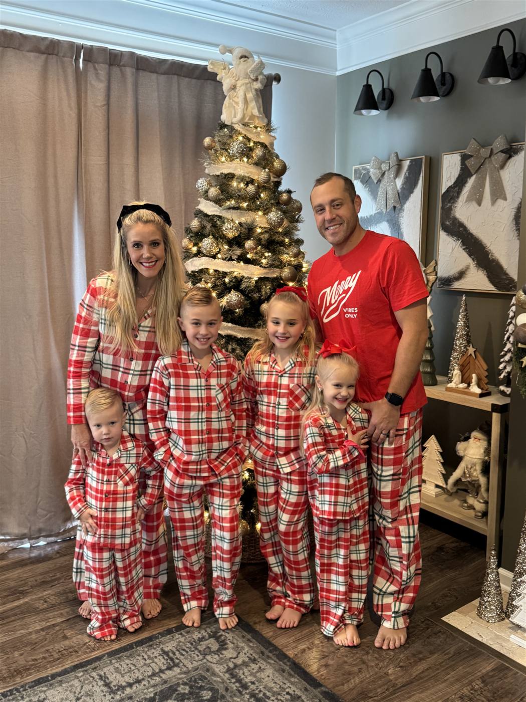 The Barker family in matching pajamas at Christmas