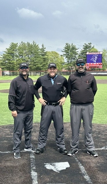 Baseball umpire crew on the field